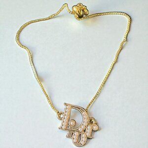 Dior Gold White Resin Pearl Zip Pull Iridescent Stretch Bracelet